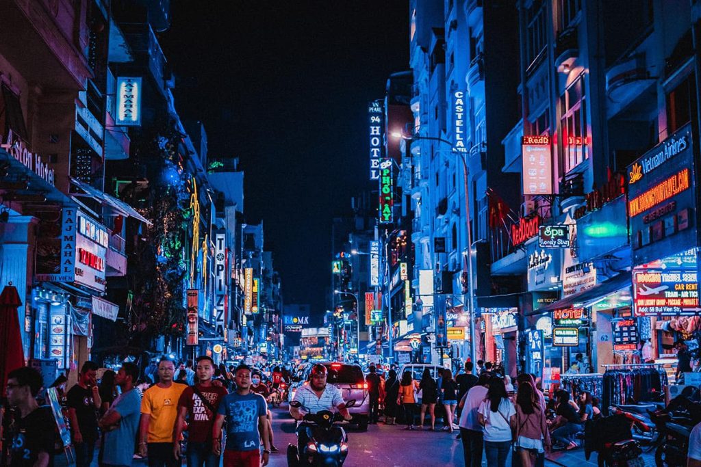 Bui Vien Street packed with people, bars, and neon lights at night in Ho Chi Minh City