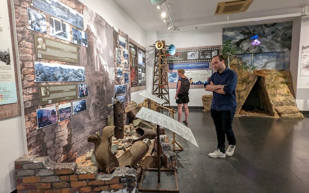 Visitors exploring the War Remnants Museum exhibits in Ho Chi Minh City