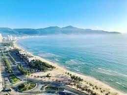 Scenic view of My Khe Beach with clear blue water and white sand