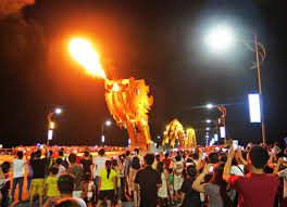 Family watching fire show at Dragon Bridge Danang