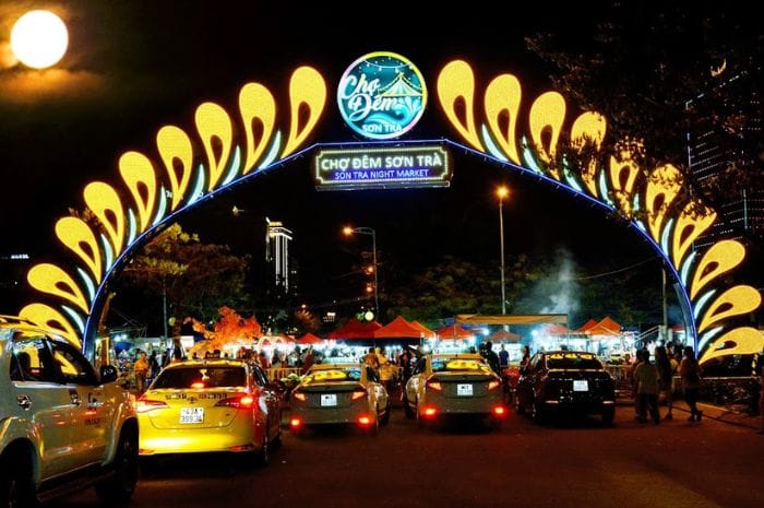 Son Tra Night Market with food stalls and tourists in Danang