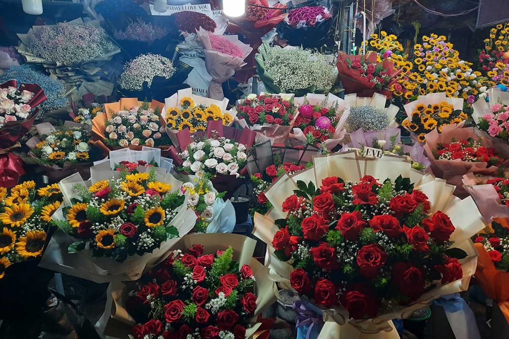 Colorful flower stalls at Ho Thi Ky Market