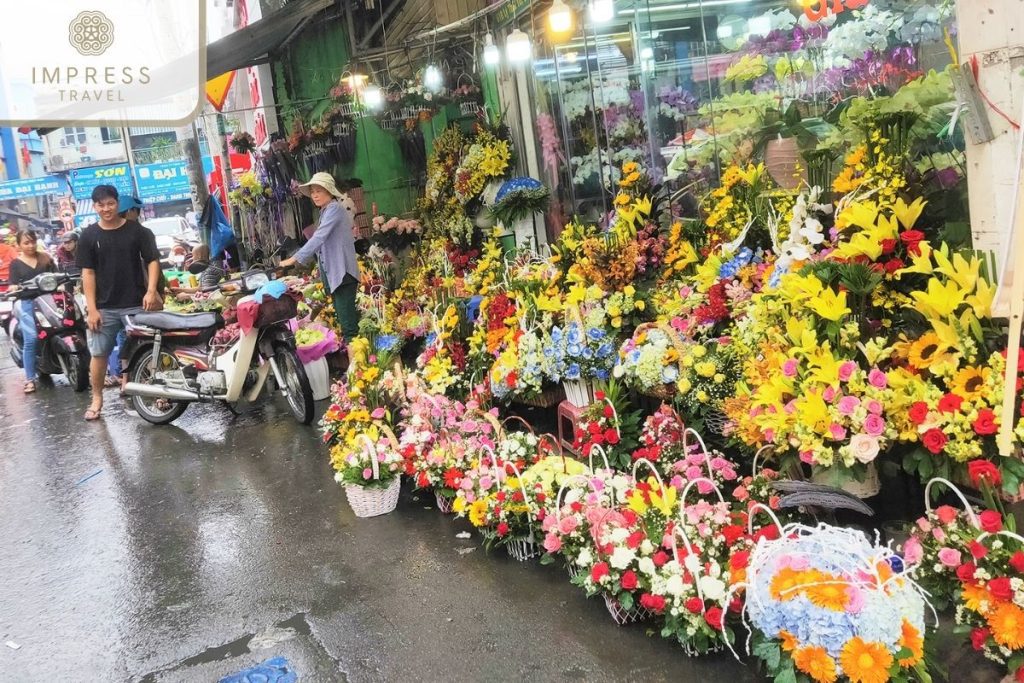 Colorful flower stalls at Ho Thi Ky Market