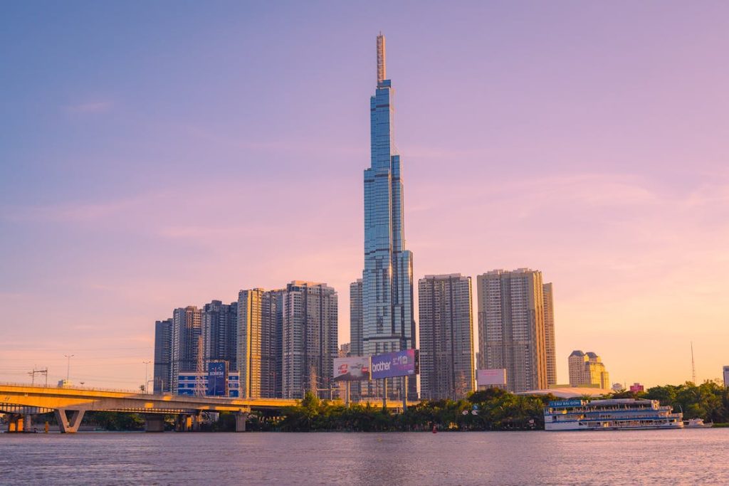 View of Landmark 81 skyscraper in Ho Chi Minh City with surrounding park and river