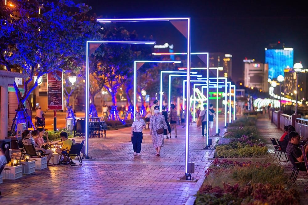 Night view of Bach Dang Street Danang with colorful lights and riverside walk