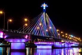 Han River Swing Bridge lighting up at night in Da Nang, Vietnam