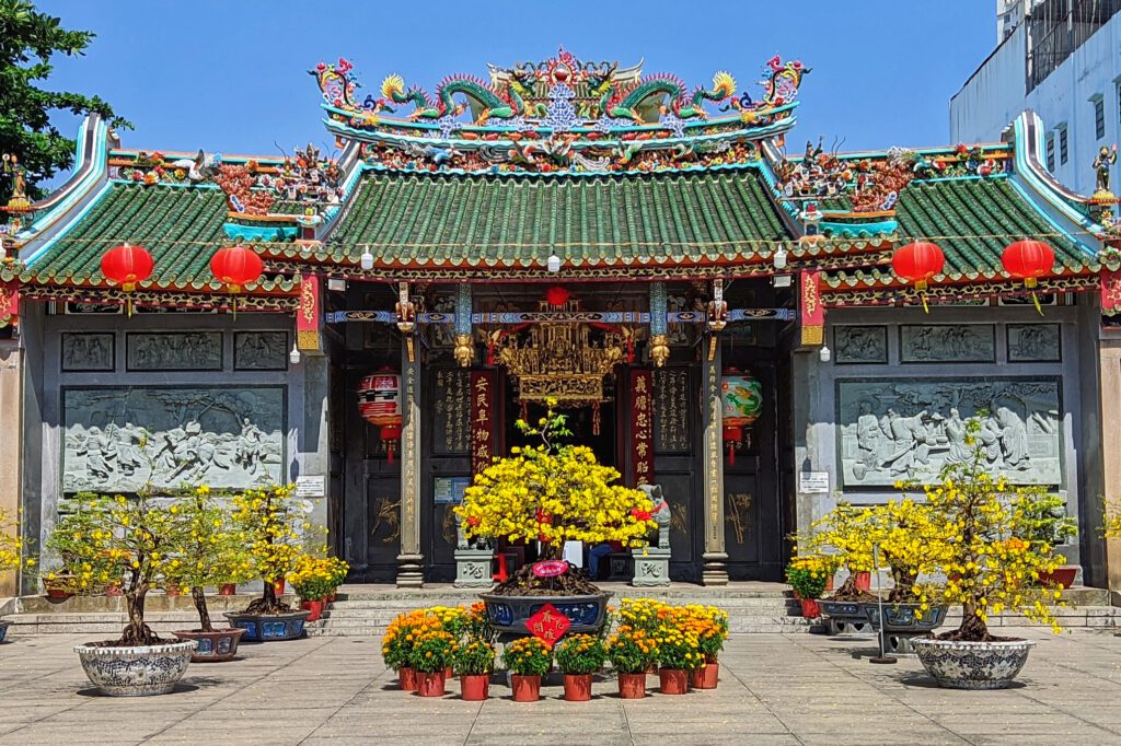 Thien Hau Temple with intricate Chinese architecture and incense coils hanging from the ceiling