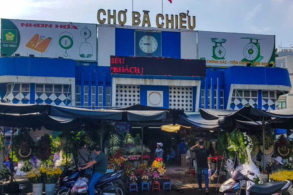 Local vendors selling produce at Ba Chieu Market in Saigon