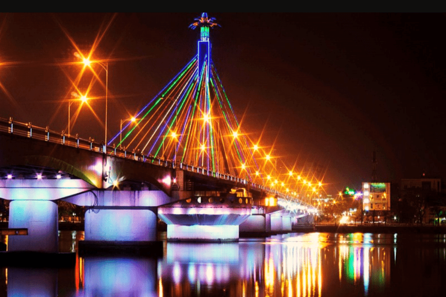Han River Bridge lit up at night during Da Nang nightlife