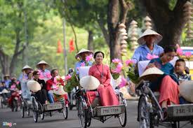 Family enjoying a cyclo ride in Hanoi Old Quarter