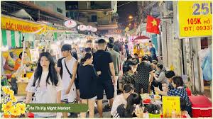 Crowds enjoying street food at a Vietnamese night market