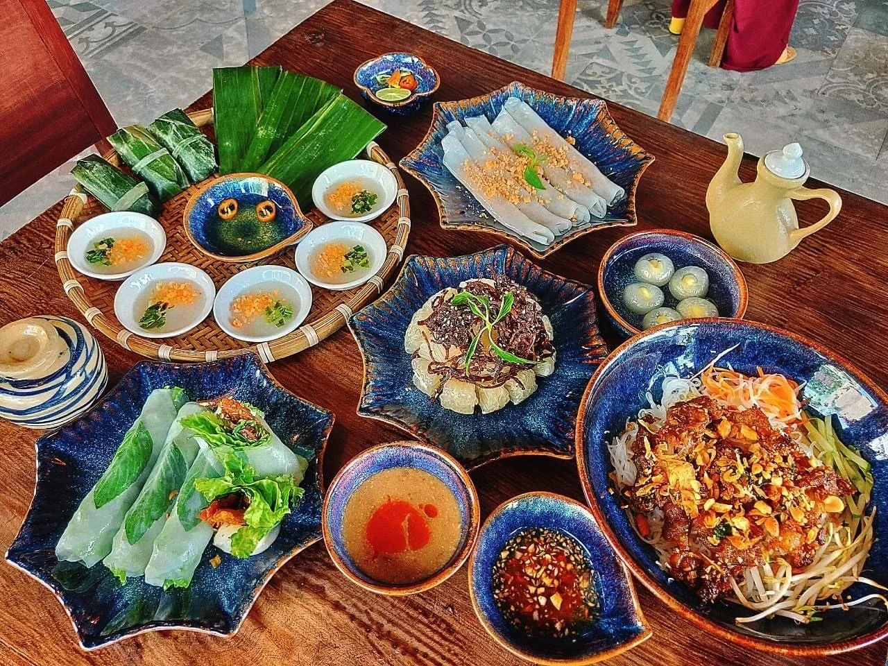 Vietnamese family enjoying dinner at a cozy restaurant in Saigon
